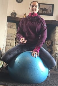 seated straddle on ball